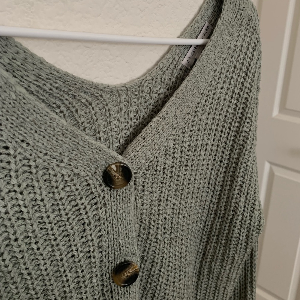 Sage green cardigan with button enclosure